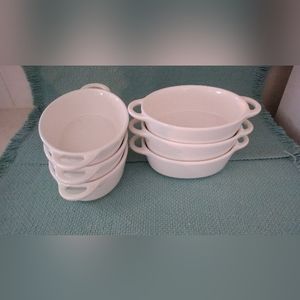 Set of six oval white ceramic ramekins
